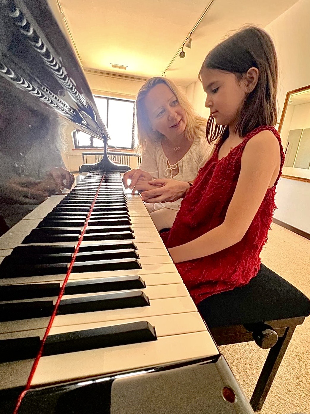 Írem tijdens haar pianoles